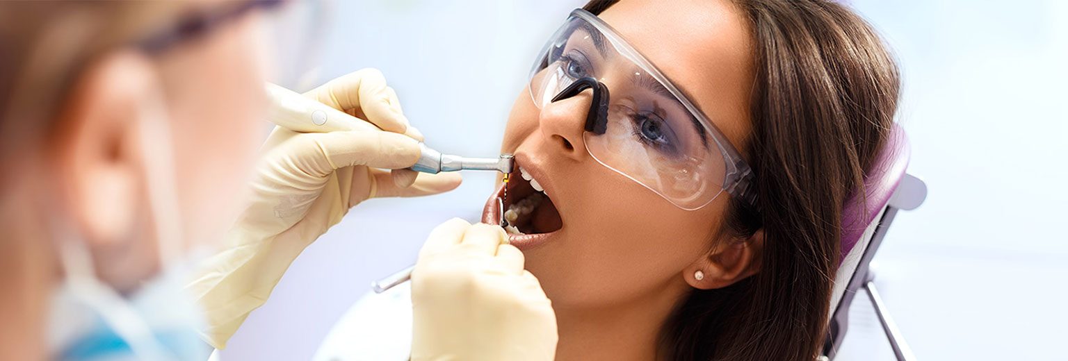 Lady having a root canal therapy
